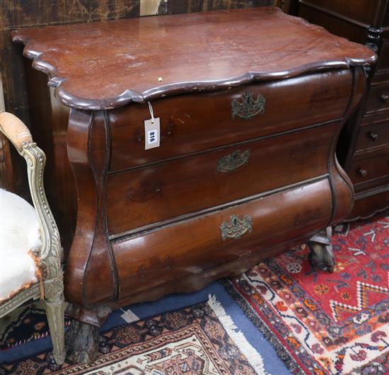 A 19th century Dutch walnut bombe chest W.97cm